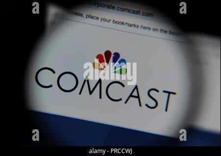 Die Comcast Website durch ein Vergrößerungsglas gesehen Stockfoto