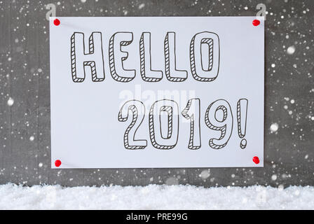 Etikett auf Zement Wand, Schneeflocken, Text Hallo2019 Stockfoto