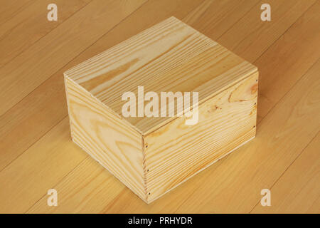 Holz- geschlossene Box auf Holzboden Hintergrund Stockfoto