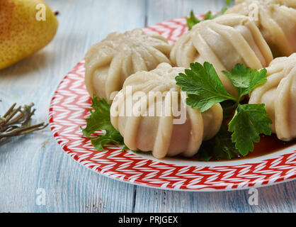 Kawa Manta, Uigurischen Lamm und Kürbis Knödel, Uigurischen Küche, Asien traditionellen verschiedene Gerichte, Ansicht von oben Stockfoto