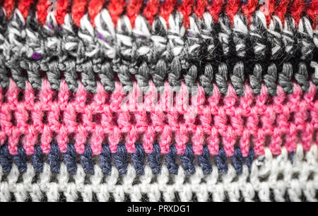 Mehrfarbig gestrickt gemütliche Textur closeup Hintergrund, das Konzept der Vielfalt Stockfoto