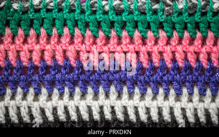 Mehrfarbig gestrickt gemütliche Textur closeup Hintergrund, das Konzept der Vielfalt Stockfoto