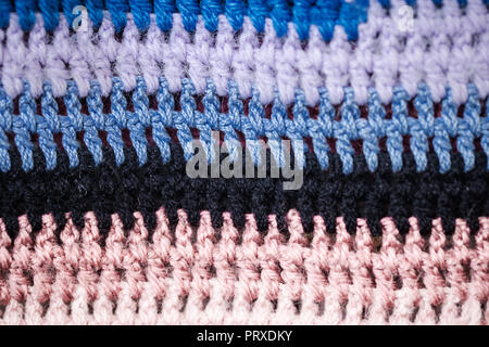 Mehrfarbig gestrickt gemütliche Textur closeup Hintergrund, das Konzept der Vielfalt Stockfoto