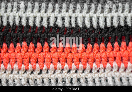 Mehrfarbig gestrickt gemütliche Textur closeup Hintergrund, das Konzept der Vielfalt Stockfoto