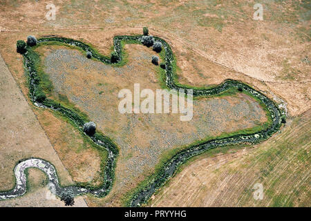 USA, Antenne von Stream durch die Weide im westlichen Nebraska läuft Stockfoto