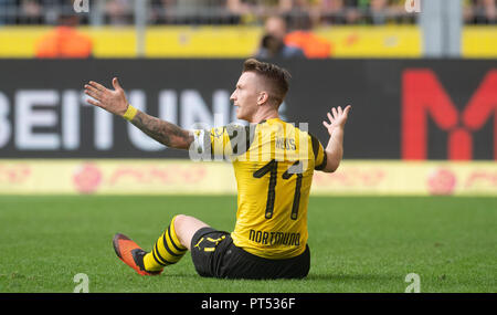 06 Oktober 2018, Nordrhein-Westfalen, Dortmund: 06. Oktober 2018, Deutschland, Dortmund: Fußball: Bundesliga, Borussia Dortmund vs FC Augsburg, 7. Spieltag am Signal Iduna Park. Dortmunder Marco Reus. Foto: Bernd Thissen/dpa - WICHTIGER HINWEIS: DFL d DFB-Vorschriften die Verwendung von Fotografien als Bildsequenzen und/oder quasi-Video zu verbieten. Stockfoto