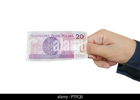 Schließen bis auf 20 Zloty Banknote in der Hand eines Mannes. Isoliertes Objekt auf weißem Hintergrund. Stockfoto