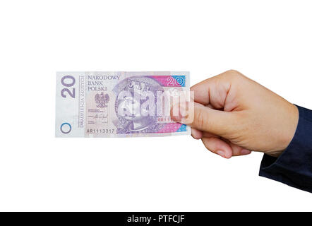 Schließen bis auf 20 Zloty Banknote in der Hand eines Mannes. Isoliertes Objekt auf weißem Hintergrund. Stockfoto