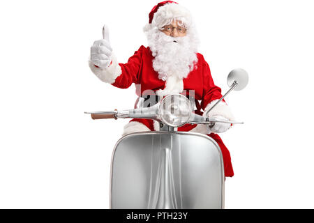 Santa Claus auf einem Roller, Daumen oben auf weißem Hintergrund Stockfoto