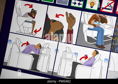 Brace Position auf die Sicherheit an Bord gezeigt British Airways Flight Safety Card Information Stockfoto