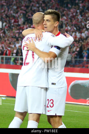 Chorzow, Polen. 11 Okt, 2018. Krzysztof PiateK (R) gesehen Feiern während der UEFA Nationen Liga Fußballspiel am Schlesischen Stadion. Kredit Damian: Klamka/SOPA Images/ZUMA Draht/Alamy leben Nachrichten Stockfoto