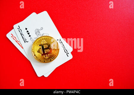 Bitcoin mit Joker Spielkarten Stockfoto