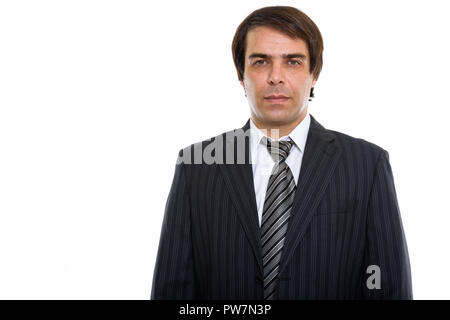 Studio shot der jungen Persischen Geschäftsmann stehend Stockfoto