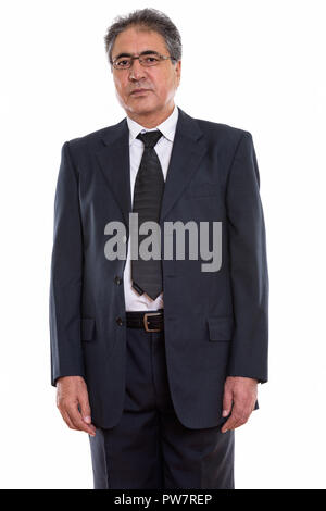 Studio shot der Persischen Geschäftsmann stand beim Tragen Stockfoto