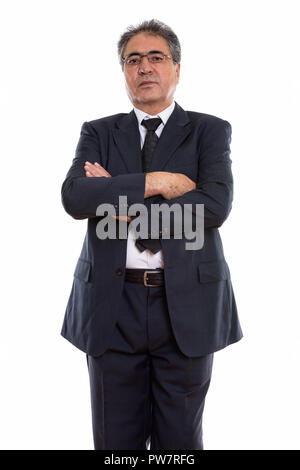 Studio shot der Persischen Kaufmanns Stehen und Tragen e Stockfoto