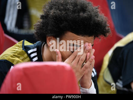 Amsterdam, Niederlande. 13 Okt, 2018. 13. Oktober 2018, in den Niederlanden, Amsterdam: Fußball: Nationen Liga A, Gruppenphase, Gruppe 1 Spieltag 3: Niederlande gegen Deutschland in der Johan Cruyff Arena. Leroy Sane aus Deutschland ist auf der Bank sitzen. Credit: Ina Faßbender/dpa/Alamy leben Nachrichten Stockfoto