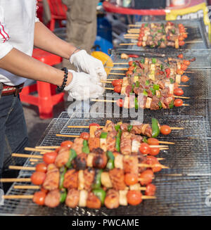 Essen gebacken mit Stöcken, Seoul Street Food, Korea. Stockfoto