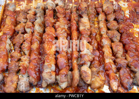 Essen gebacken mit Stöcken, Seoul Street Food, Korea. Stockfoto