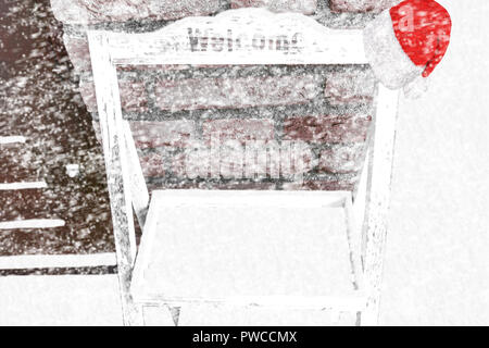 Weihnachten Hintergrund Holz Willkommen Zeichen Kabinett Brett mit einer Weihnachtsmütze auf der Oberseite im Schnee in einem Schneesturm abgedeckt Stockfoto