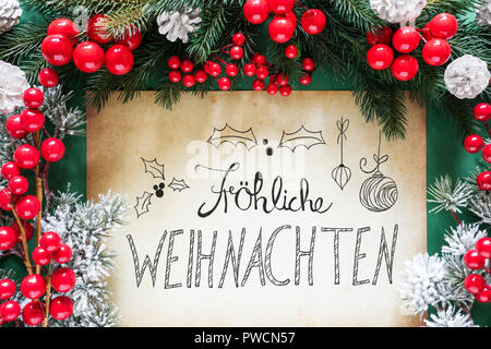 Weihnachtsdekoration, Deutsche Kalligraphie bedeutet Frohe Weihnachten Frohe Weihnachten Stockfoto