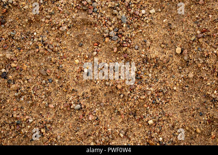 Textur aus Steinen, Sand natürlichen Ursprungs Hintergrund Hintergrundbild Stockfoto
