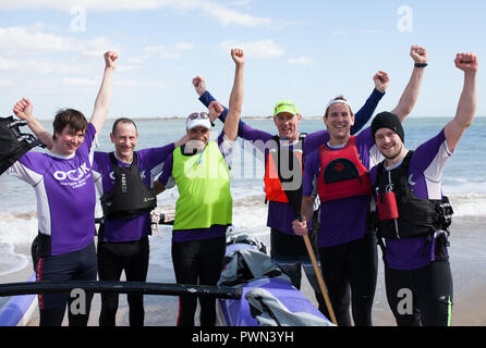 Gruppenbild der Gewinner eines Drachenboot Stockfoto