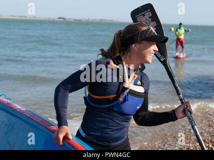 Weibliche Meister einer paddle Board Race Stockfoto