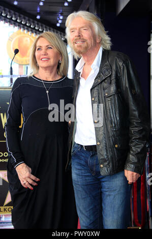 Los Angeles, USA. 16 Okt, 2018. Sir Richard Branson mit Frau Joan Templeman an der Zeremonie Award, einen Stern zu Richard Branson auf dem Hollywood Walk of Fame. Los Angeles, 16.10.2018 | Verwendung der weltweiten Kredit: dpa/Alamy leben Nachrichten Stockfoto