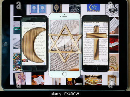 Jüdische, christliche und muslimische Kreuz und Halbmond, religiöse Symbole von Christentum, Islam, Judentum auf 3 Smartphones mit digitalen App. Stockfoto