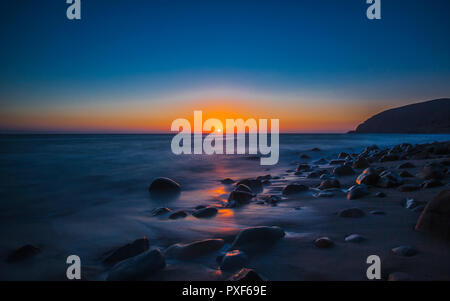 Einen schönen Sonnenuntergang am Strand von Malibu, CA Stockfoto