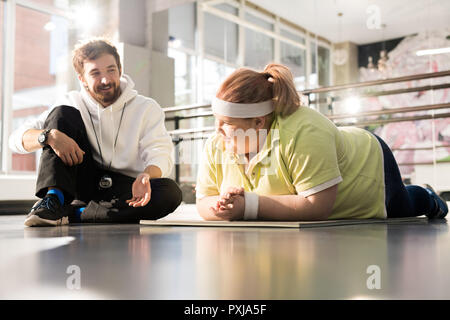 Gewicht-verlust-Training mit Persona Kursleiter Stockfoto