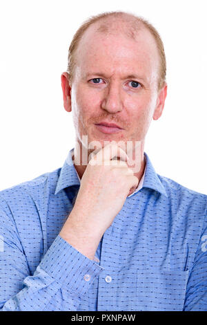 Angesichts der Geschäftsmann Denken mit der Hand am Kinn Stockfoto