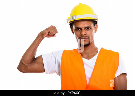 Junge afrikanische Mann Bauarbeiter flexing seinen Arm Stockfoto
