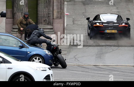 Dreharbeiten für ein Auto Verfolgungsjagd mit einem McLaren Sportwagen und Motorräder findet in Glasgow City Centre, für einen neuen schnellen und wütenden Franchise Film. Stockfoto