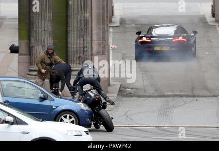 Dreharbeiten für ein Auto Verfolgungsjagd mit einem McLaren Sportwagen und Motorräder findet in Glasgow City Centre, für einen neuen schnellen und wütenden Franchise Film. Stockfoto