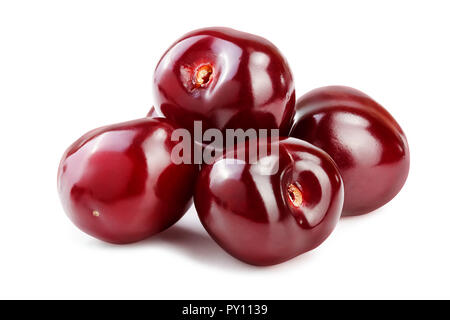 Süße rote Kirschen auf weißem Hintergrund Makro isoliert. Stockfoto