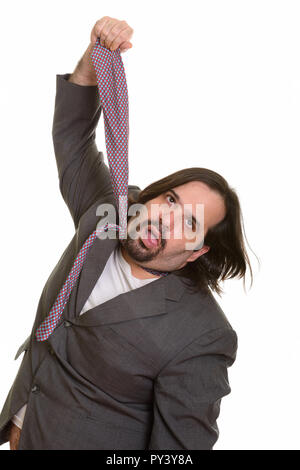 Fat kaukasischen Geschäftsmann seine eigene Riegel ziehen Stockfoto