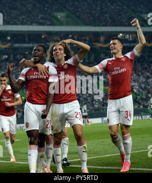 Lissabon, Portugal. 25 Okt, 2018. Spieler von Arsenal Feiern während der Europa League Gruppe E dritte Runde Fußball Match zwischen Sporting CP und dem FC Arsenal an Jose Alvalade Stadion in Lissabon, Portugal, am Okt. 25, 2018. Arsenal gewann 1:0. Credit: Zhang Liyun/Xinhua/Alamy leben Nachrichten Stockfoto