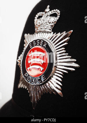 Essex Polizei Helm und Abzeichen Stockfoto