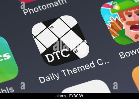 London, Großbritannien, 26. Oktober 2018: Symbol der mobile App tägliche Thematische Kreuzworträtsel aus PlaySimple Spiele Pte Ltd. auf einem iPhone. Stockfoto