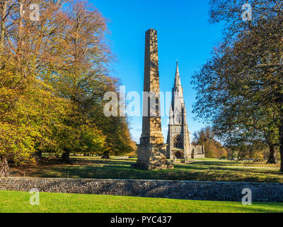 Obelisk und St Marys Kirche in Studley Park in der Nähe von Bedale North Yorkshire England Stockfoto