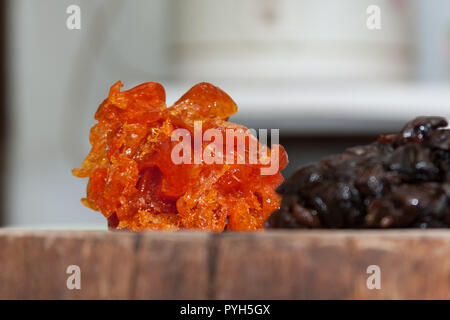 Kandierten kumquats auf Holz Schneidebrett, hausgemachte, Taiwan Stockfoto