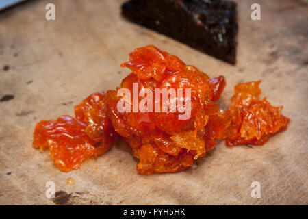 Kandierten kumquats auf Holz Schneidebrett, hausgemachte, Taiwan Stockfoto