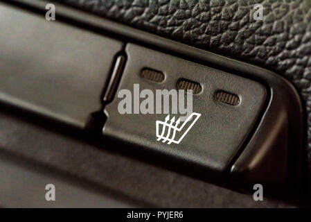 Auto Sitzheizung Taste im Innenraum Stockfoto