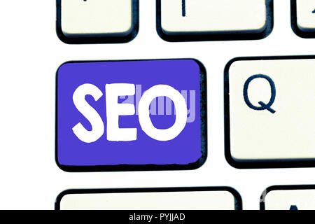 Handschrift text Seo. Konzept Bedeutung Praxis der Steigerung der Quantität und der Qualität der Besucher auf eine Website. Stockfoto