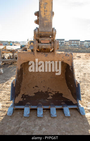 Bagger Schaufel auf eine Entwicklung des neuen Gehäuses in Castle Rock, Colorado Stockfoto