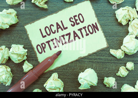 Handschrift text lokalen SEO Optimierung. Konzept, d. h. erhöhen Sie die Sichtbarkeit zu Rang auf der Liste. Stockfoto