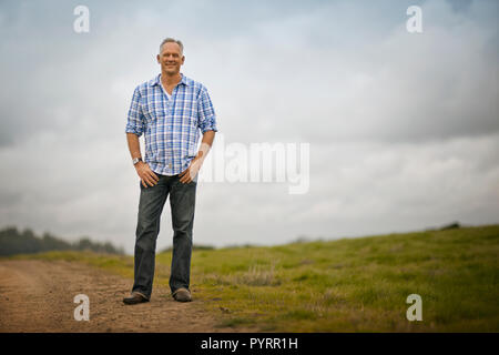 Porträt einer lächelnden Mann mittleren Alters. Stockfoto