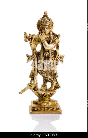 Krishna Statue auf Weiß Stockfoto