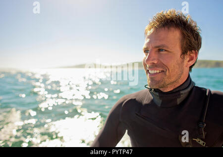 Porträt einer Surfer im Wasser. Stockfoto